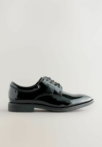 Chaussure habillée en cuir verni noir avec un bout rond, à lacets et une finition lisse et brillante. Dispose d'une semelle en caoutchouc basse.