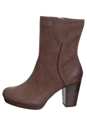 Brown leather ankle boot with a round toe, side stitching details, and a textured wooden block heel. Smooth finish, 4-inch heel height.