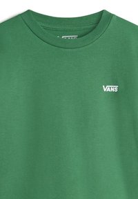 Zelené bavlněné tričko s kulatým výstřihem a krátkými rukávy. Na levé části hrudi je malé bílé logo Vans. Měkká textura.