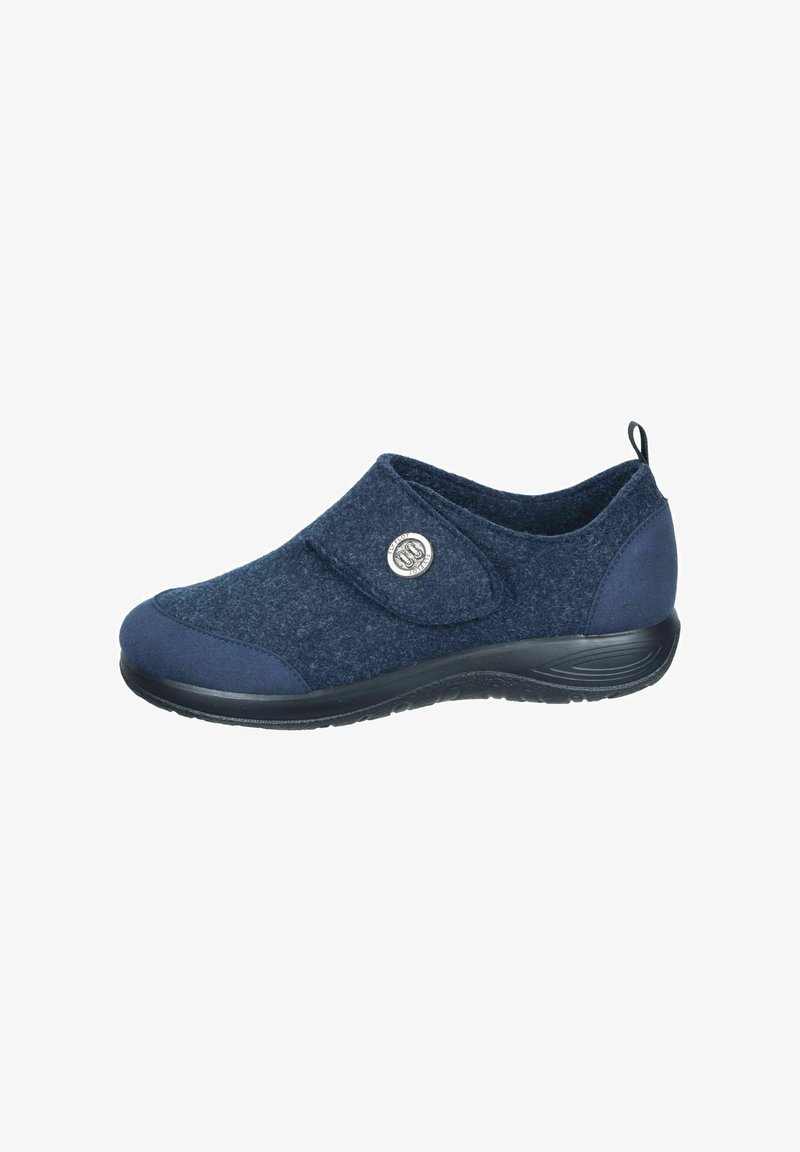 Marineblaue Slipperschuh mit einem Obermaterial aus Filz und kontrastierenden glatten Akzenten. Verfügt über einen Klettverschluss und eine strukturierten schwarzen Laufsohle.