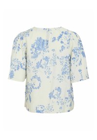 Blusa a maniche corte in tessuto color crema chiaro con un motivo floreale blu, presenta un collo rotondo e spalle leggermente arricciate.