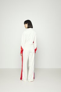 adidas Originals TRACK - Bluză de trening - white/vivid red