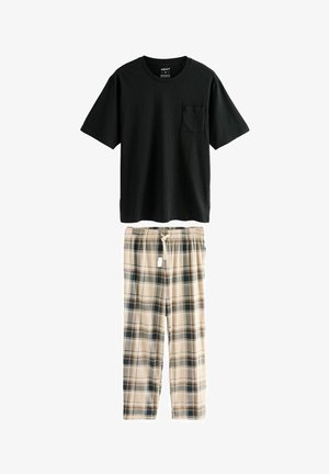 Melnas kokvilnas T-krekls ar kabatu, saskaņots ar beigu plānu pidžamu biksēm, kurām ir zilu un zaļu akcentu un elastīga josta.