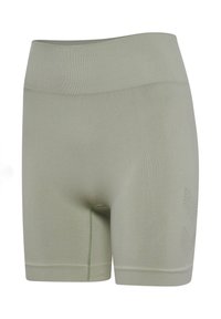 Ljusgröna cykelshorts tillverkade av stretchigt material med en sömlös midja och diskreta logotypdetaljer på sidan.