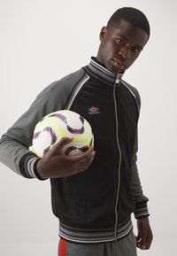 Umbro MONOGRAM ANTHEM JACKET - Treniņjaka - black/iron gate