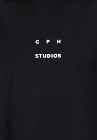Black sweatshirt with a smooth texture featuring the text "CPH STUDIOS" in white font centered on the front.