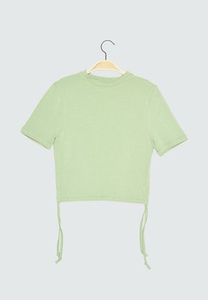 Kortærmet, cropped T-shirt i lysegrønt bomuld med rund halsudskæring og justerbare snøre i kanten for en tilpasselig pasform.