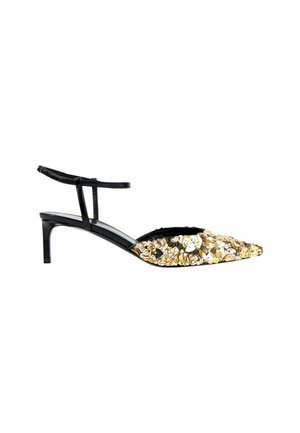 Chaussure noire à talon kitten à brides avec un bout pointu recouvert de sequins brillants dorés et argentés.