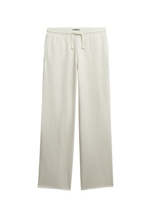 Beżowe spodnie dresowe o szerokich nogawkach wykonane z miękkiego materiału będącego mieszanką bawełny. Posiadają elastyczną talię z sznurkiem oraz boczne kieszenie.