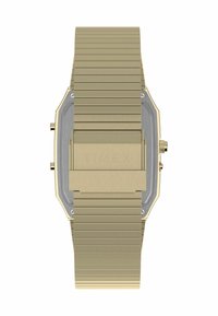 Montre en métal doré avec un bracelet rainuré, un boîtier octagonal et un cadran enfoncé. Comprend une couronne et des détails matériels minimalistes. Fini texturé.