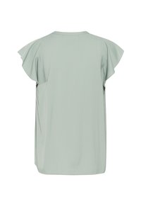 Blouse vert clair à manches courtes avec manches à volants et encolure ronde, vue de dos sur fond blanc.