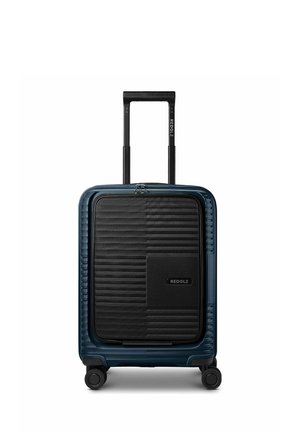 Dark blue hard-shell suitcase with black front pocket, four spinner wheels, and extended telescopic handle with "REDOLZ" branding.