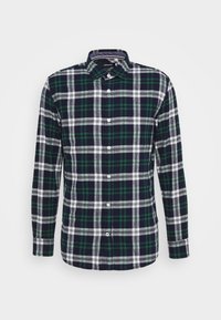 Ruudunmuotoinen flanellipaita tummansinisessä, vihreässä ja valkoisessa. Pitkät hihat, nappisauma edessä, ruudullinen kuosi, kauluspääntie ja pehmeä rakenne.