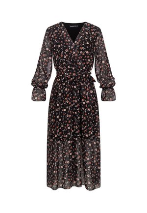 Czarna sukienka w kwiaty z lekkiego, przezroczystego materiału. Posiada głęboki dekolt w kształcie litery V, długie bufiaste rękawy, wiązanie w talii oraz lekko opadającą spódnicę z warstwowym dołem.