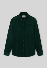 Chemise en velours côtelé vert foncé à manches longues avec un devant boutonné, un col pointu et une coupe droite avec des poignets au niveau des poignets.