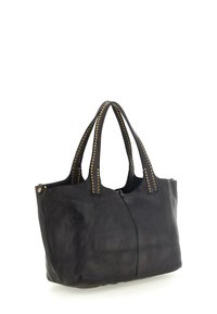 Borsa tote nera in pelle con manici doppi, caratterizzata da borchie dorate lungo le cinghie, superficie morbida e texture leggermente scesa.