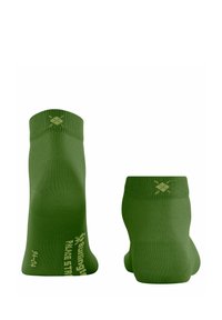 Calzini sportivi verdi realizzati in un materiale liscio e elasticizzato. Presentano risvolti a coste e motivi testurizzati. Branding evidente sui lati.