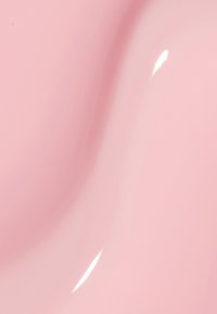 Superficie liscia e lucida con una delicata tonalità rosa, che mette in mostra una leggerissima lucentezza e curve morbide in tutta la texture. Nessun motivo particolare.