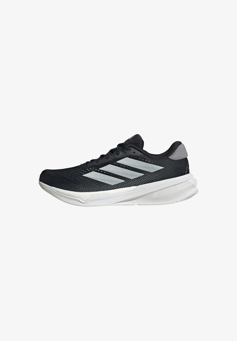 Black athletic shoe with mesh upper, featuring three silver side stripes, a lightweight white sole, and a padded heel for support.