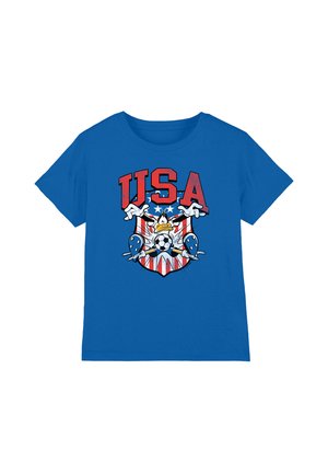 Blue t-shirt with "USA" text above a cartoon duck holding a soccer ball in front of a shield with red and white stripes and stars.