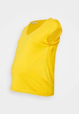 T-shirt de maternidade amarelo com decote em V, feito de algodão macio e elástico. Manga curta com um corte descontraído, projetado para acomodar uma barriga em crescimento.