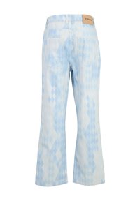 Light blue denim flared pants featuring a diamond pattern, five pockets, and a leather waistband label. Soft texture, casual design.