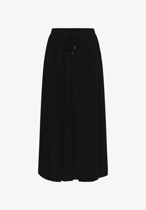 Black ankle-length skirt with elastic waistband and drawstring tie, featuring a front slit and flowy fabric.