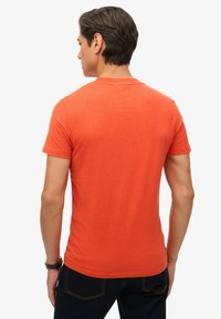 Superdry & Co VINTAGE LOGO - T-shirts print - bright orange marl