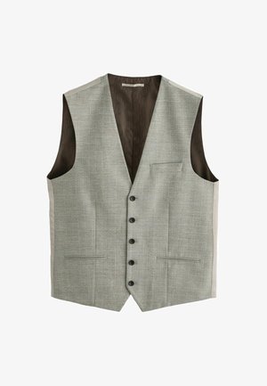 Pelēks kvadrātveida žakete ar pieciem pogām, izgriezumu apkakli, divām priekšējām kabatām un kontrastējošu brūnu oderi. Sānu paneļi gaiši bēšā krāsā.