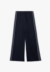 Navy brede bukser lavet af blødt materiale, med hvide sidestreger og elastisk talje, designet for komfort og let bevægelse.