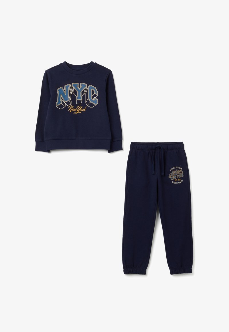 Navy blue sweatshirt with "NYC New York" graphic and matching jogger pants featuring an elastic waistband and side pocket embroidery detail.