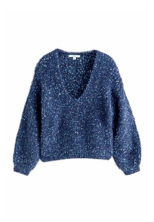 Tömött, tengerészkék pulóver, V-kivágással, hosszú, ballon ujjakkal, és egy textúrált, bolyhos anyagból, amely színes pöttyökkel van átszőve.