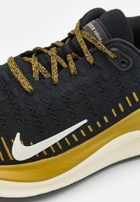 Nike Performance REACTX INFINITY  - Bėgimo batai plentui - black/sea glass/bronzine/olive aura/amber brown/coconut milk