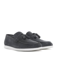 Gray suede loafers with decorative tassels, featuring a slim, white rubber sole and a smooth texture. Ergonomic design for comfort.