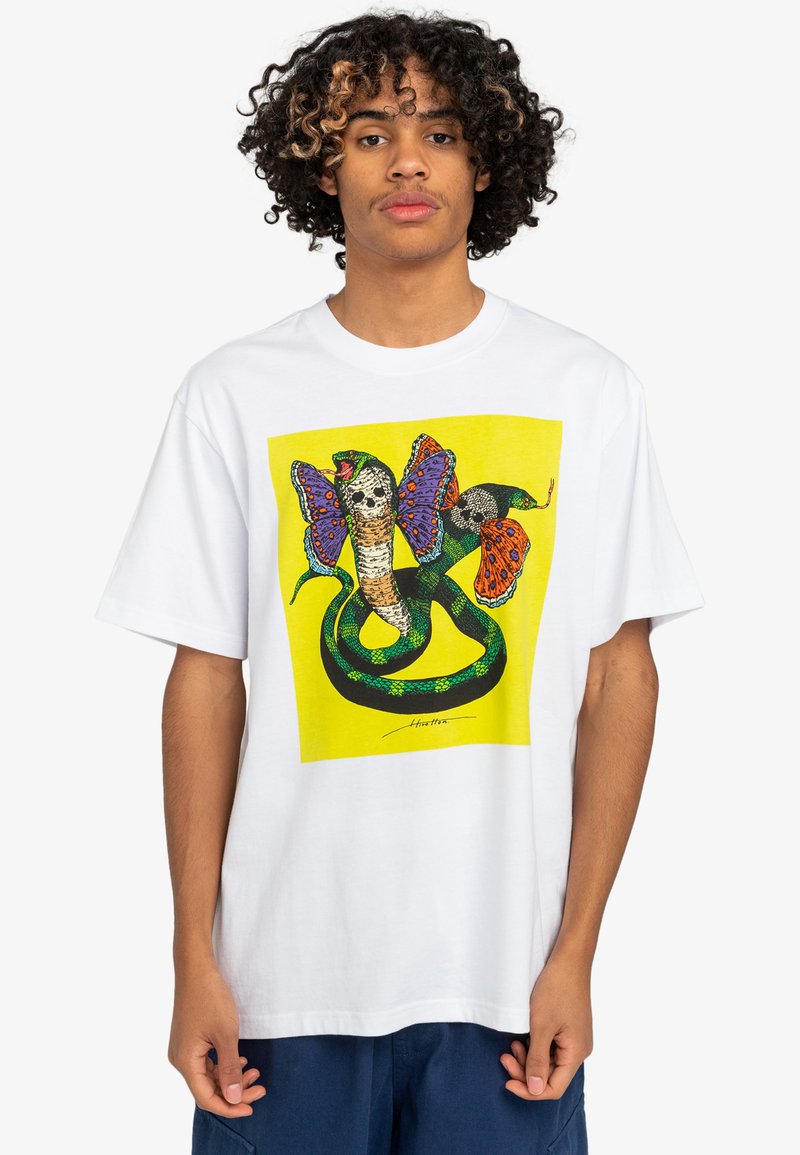 White cotton t-shirt featuring a colorful print of a snake intertwined with butterflies on a bright yellow background.