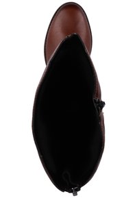 Bottine en cuir marron avec un bout arrondi et une finition lisse. Intérieur en tissu noir. Détail de fermeture éclair latérale pour une entrée facile.