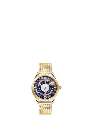 Gold wristwatch with a woven metal band, dark celestial-themed face featuring colorful planets, stars, and a sun symbol near the right.