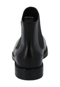 Schwarze Leder-Stiefelette mit elastischen Seitenpaneelen, abgerundeter Zehenpartie und flacher Gummisohle. Glatte Textur mit dezenten Steppnähten.