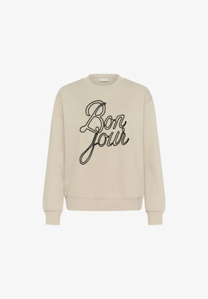Beżowy sweter z długimi rękawami, z prążkowanymi mankietami i dołem, z czarnym haftem "Bonjour" na przodzie. Miękka tekstura.