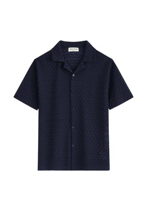 Chemise bleu marine foncé à manches courtes avec boutons, motif texturé subtil en zigzag et petit col.