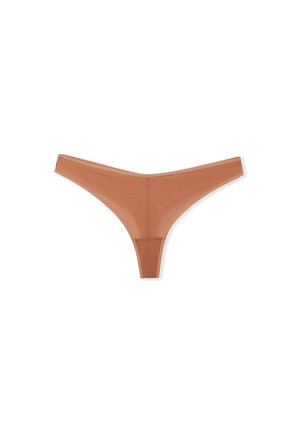 Perizoma trasparente color carne con un design minimalista, texture liscia e una forma triangolare stretta sul retro, caratterizzato da sottili lati elastici.