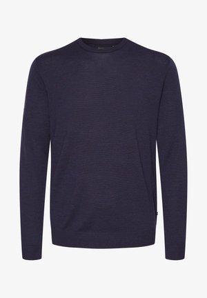 Tumesinine ümar kaelusega sviiter, mis on valmistatud kerge kudumismaterjali. Omab pikki varrukaid ja soonikkoes äärt, millel on aldim tekstuur.