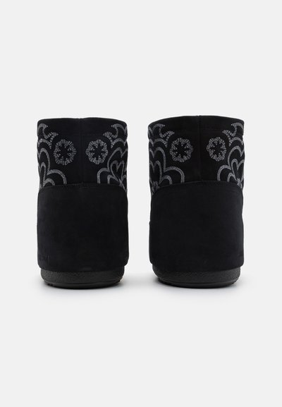 Black suede ankle boots with embroidered patterns in light gray, featuring a soft texture and rounded shape, designed for comfort and warmth.