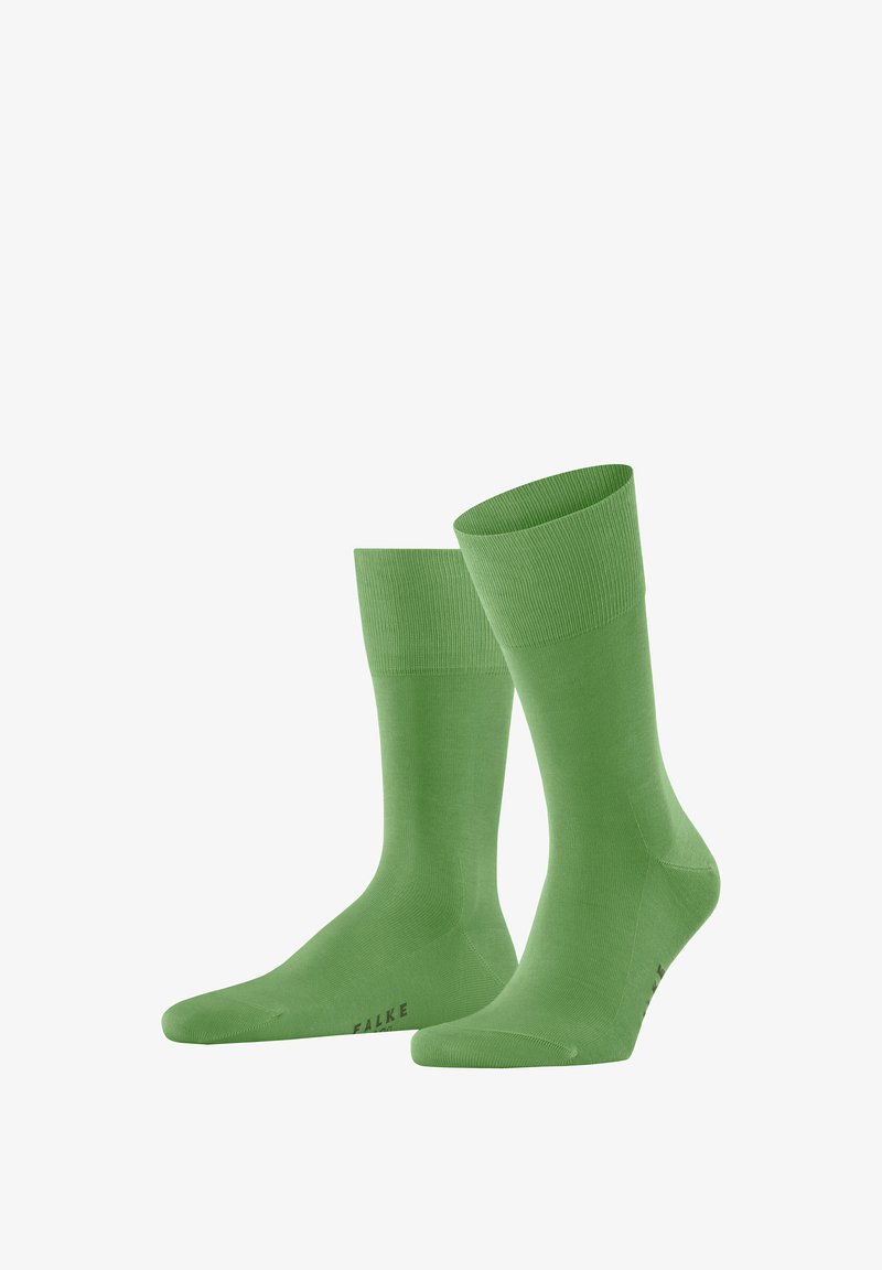 Grüne knielange Socken aus glattem, dehnbarem Material. Sie verfügen über einen gerippten Bund und ein dezentes Logo-Detail an der Spitze.