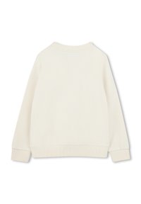 Felpa color beige chiaro con collo a girocollo a coste, maniche lunghe e vestibilità rilassata. Tessuto morbido con cuciture a vista e senza dettagli aggiuntivi.