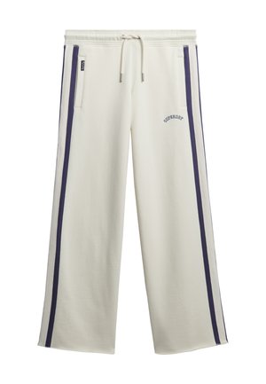 Crème kleurige wijde joggingsbroek met marineblauwe zijkanten, trekkoord in de taille, voorzakken en het "Superdry" logo op de linker dij.
