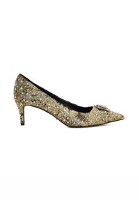 Gold and silver embellished high heel shoe, with a pointed toe and small heel, featuring a decorative brooch on the front. Textured surface.