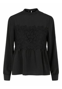 Blouse noire à manches longues avec un col montant, présentant une superposition de dentelle florale sur la poitrine et un bas amplement évasé de style peplum.