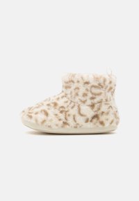 Leopard-print bootie slipper in beige and white plush fabric, featuring a cushioned sole and a small loop for easy wear.