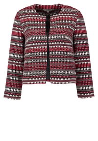 Veste légère à motifs présentant un design géométrique en rouge, noir et blanc, avec un col rond et une fermeture à l'avant.